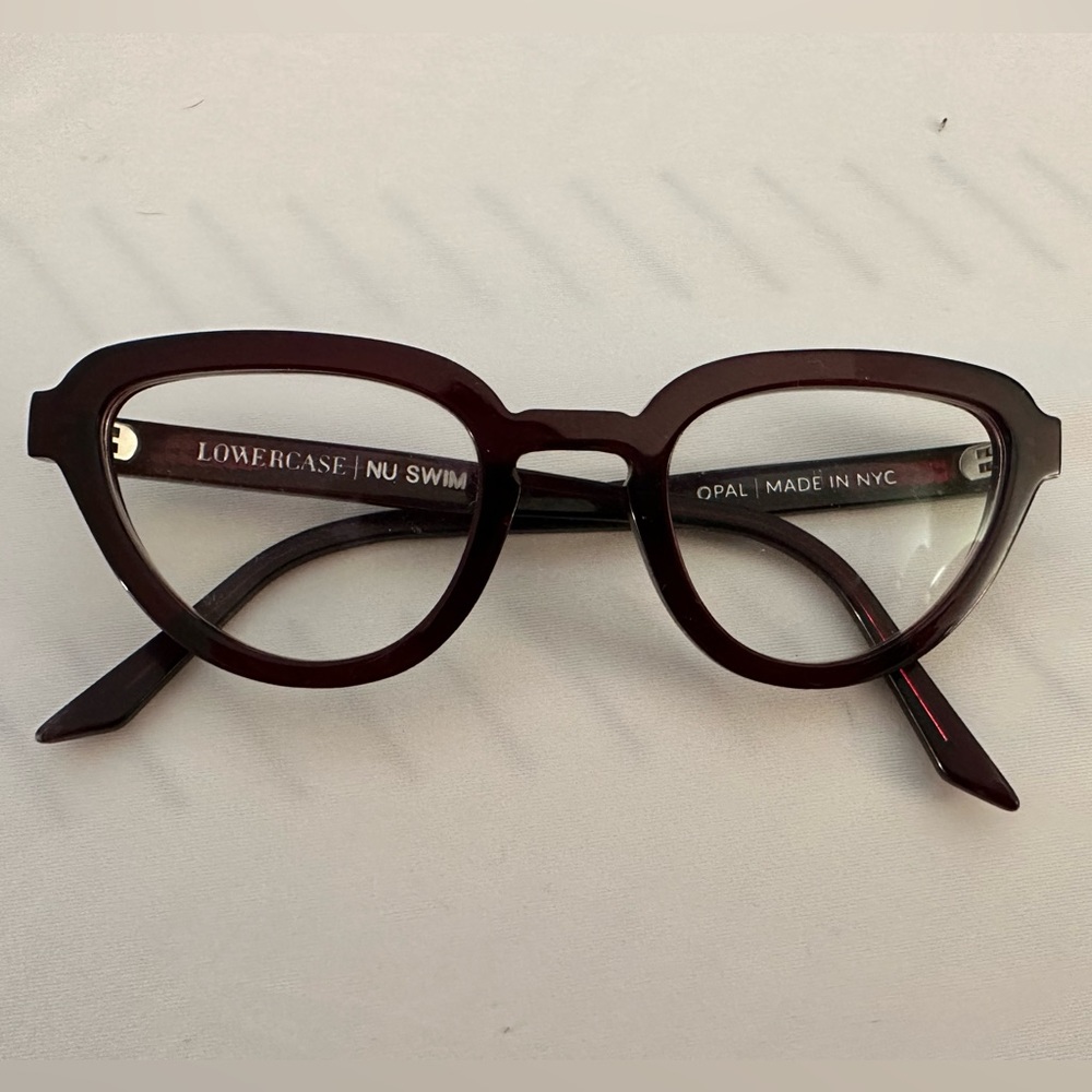 Lowercase opal nu swim eyeglasses in ox blood. Lens 48mm temple 140